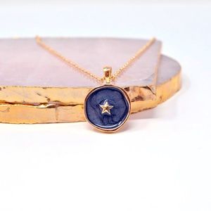 Black and gold star pendant necklace
